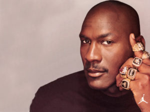 Michael Jordan with his Championship Rings