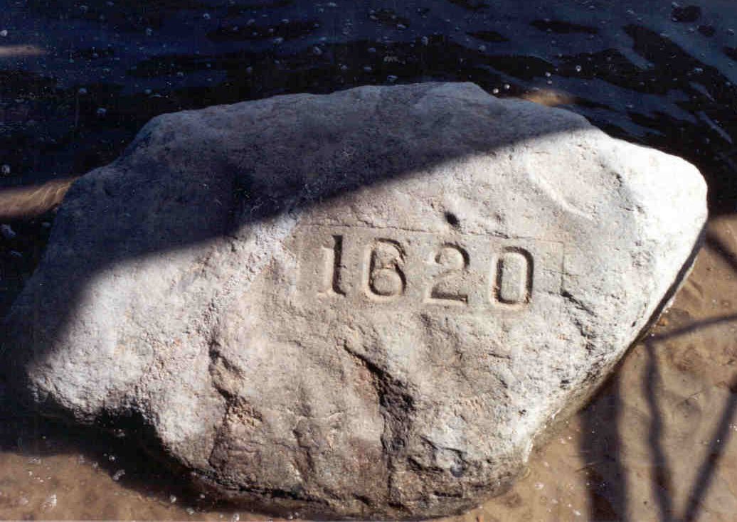 The remaining portion of Plymouth Rock, with the year of landing etched onto its surface