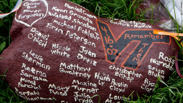 The names of the victims on a rock at the campus